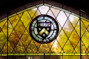 Stained glass Kenyon College seal in Ransom Hall